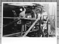 Men working on hull